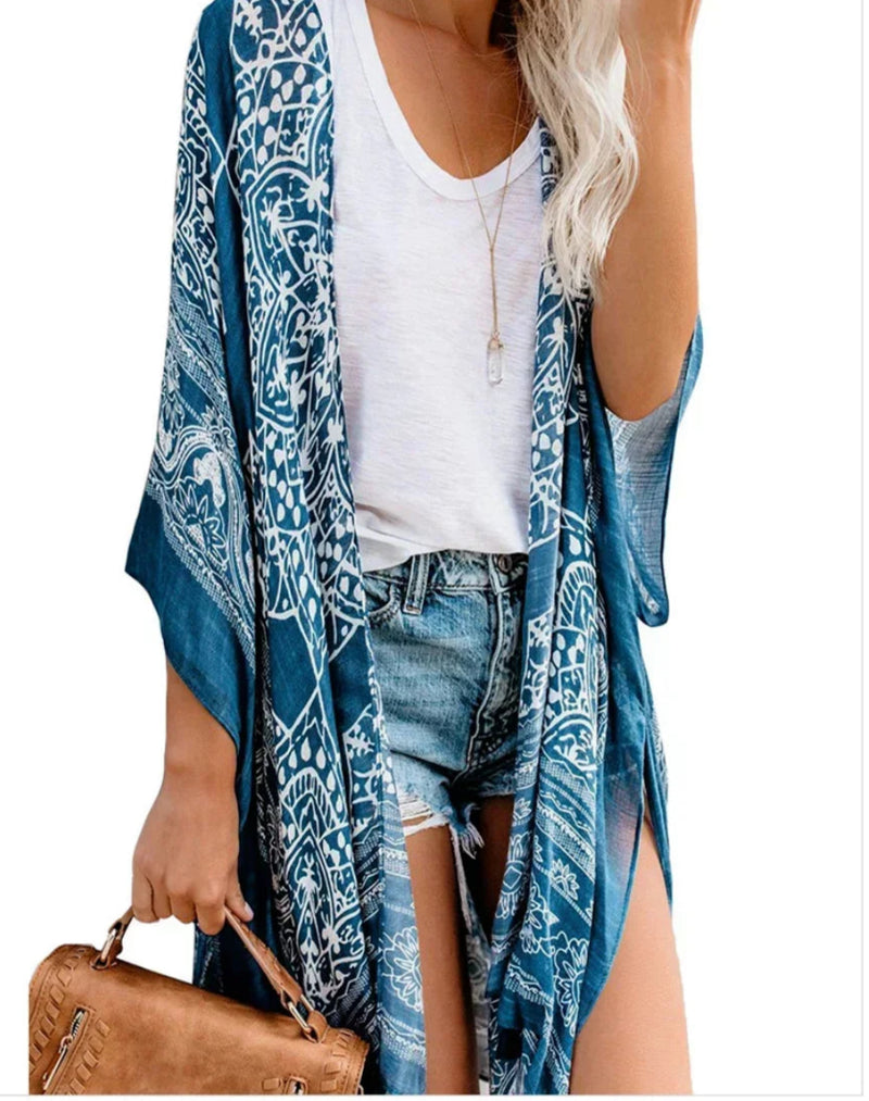 Saída de Praia Feminina 2025 – Kimono Longo Boho com Franjas, Estampado, Sexy e Plus Size | Túnica Elegante para Biquíni e Moda Praia"